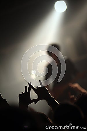 Fans hands at concert Stock Photo