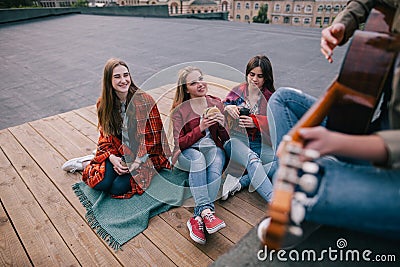 Fans on live music show. Friends leisure Stock Photo