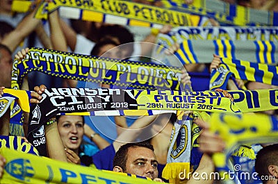Fans with scarves in Petrolul Ploiesti-Swansea FC Editorial Stock Photo