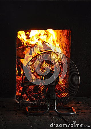 Fans used to stoke the fire Stock Photo