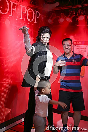 Fans with wax figure of michael jackson Editorial Stock Photo