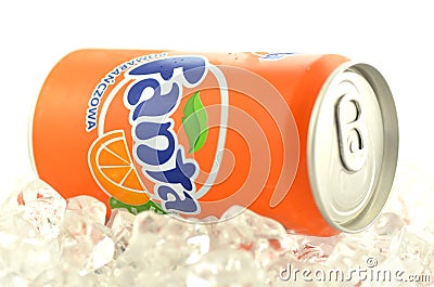 Fanta drink in a can on ice isolated on white background. Editorial Stock Photo
