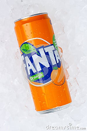 Fanta orange lemonade soft drink in a can on ice cubes portrait format Editorial Stock Photo