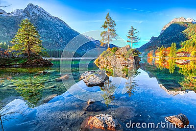 Fantastic autumn sunrise of Hintersee lake. Classic postcard vie Stock Photo