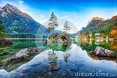 Fantastic autumn sunrise of Hintersee lake. Classic postcard vie Stock Photo