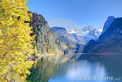 Fantastic autumn sunshine lights on mountain lake Gosausee Stock Photo