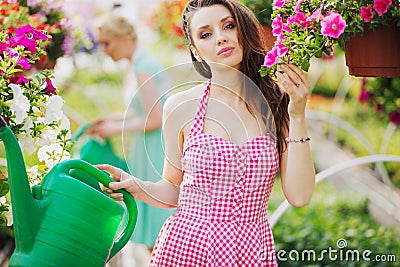 Fantastic brunette cutie in the garden Stock Photo