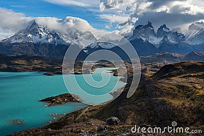 The fantastic color of the lake water is PehoÃ©`s surface water body located in Torres del Paine National Park Stock Photo