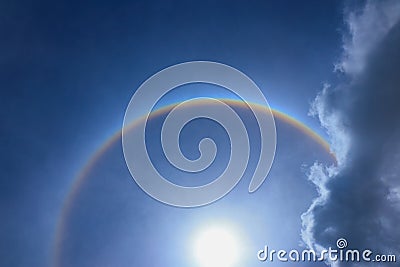 Fantastic corona ring of sun beautiful sun halo with circular r Stock Photo