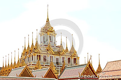 Fantastic Golden Spires of the Historic Loha Prasat Iron Castle inside Wat Ratchanatdaram Temple Located in Bangkok Old City Stock Photo