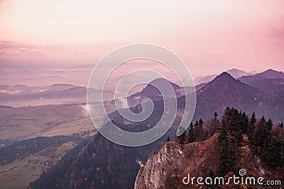 Fantastic mountain landscape, surreal pink and purple sky, the m Stock Photo