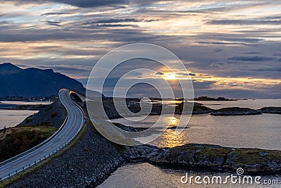 Fantastic shot of an Atlantic road in Norway in the sunset. Stock Photo