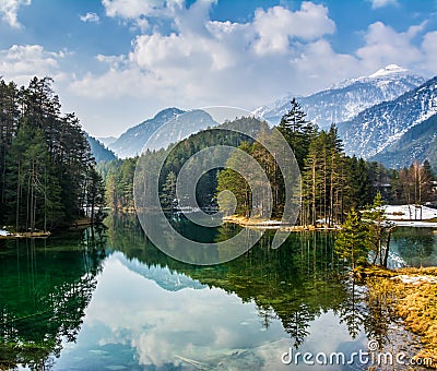 Fantastic views of the tranquil lake with amazing reflection. Mo Stock Photo