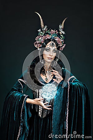 Fantasy elf woman in flower crown Stock Photo