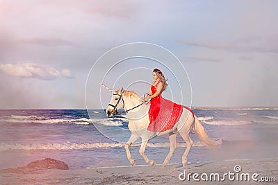 Fantasy fiction woman on unicorn Stock Photo