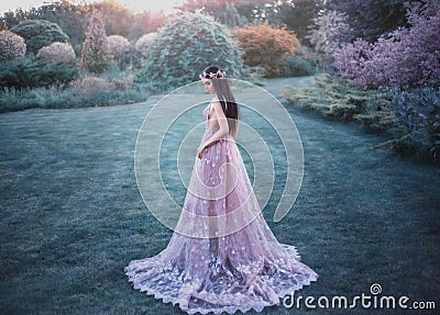 Fantasy girl in a fairy garden Stock Photo