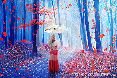 Fantasy image lonely woman with umbrella walking in forest in fairy dreamy realm. Stock Photo