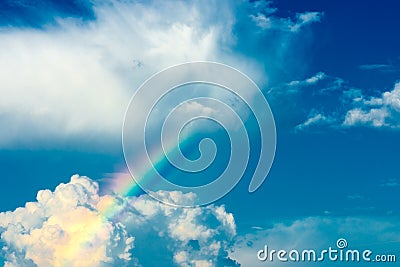 Fantasy landscape colorfull rainbow on sky abstract texture fluffy clouds shine close up view dreamy background Stock Photo