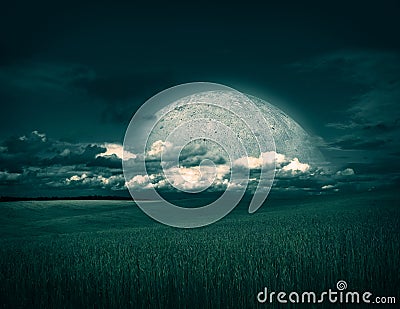 Fantasy Landscape with Field, Moon and Clouds Stock Photo