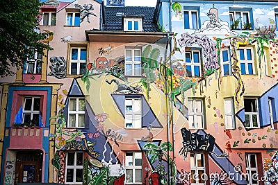 Fantasy painting on colorful house front, graffiti art on facade in hotspot of Dusseldorf, Germany Editorial Stock Photo