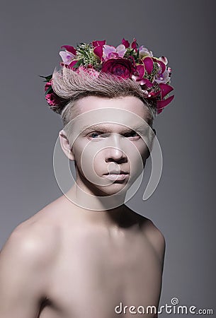 Fantasy. Styled Albino Man with Flowers Stock Photo