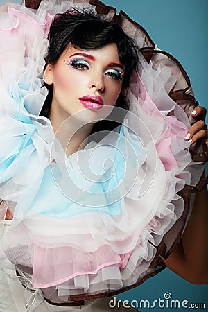 Fantasy. Young Woman with Colorful Frilled Satiny Collar Stock Photo