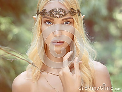 Fantasy young woman in woods Stock Photo