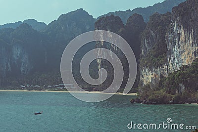 Faraway limestone rocks and tropical vegetation in Krabi, Thailand Stock Photo