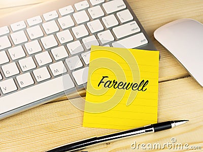 Farewell on sticky note on work desk Stock Photo