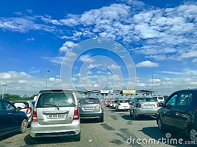 Long queues of cars at Gurgaon-Faridabad Highway ttoll ll plaza. Editorial Stock Photo