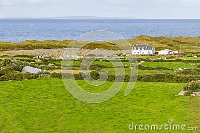 Farm in the Fanore village with Aran islands in background Stock Photo