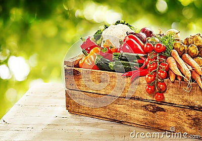 Farm fresh vegetables in a wooden crate Stock Photo