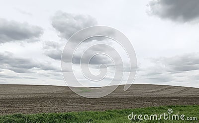 Farm Hills on the Horizon in the Iowa Countryside Stock Photo