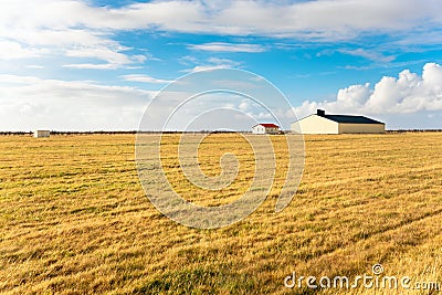 Farm in Iceland under Autumnal Blue Sky Stock Photo