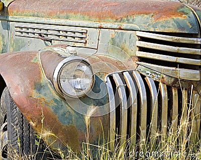 old vintage rusted pickup farm truck classic front grille Stock Photo