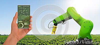 Farmer controls agricultural robot Stock Photo