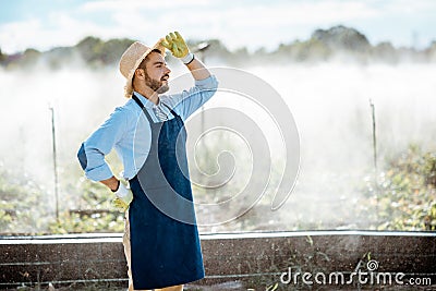 Farmer on a farmland outdoors Stock Photo