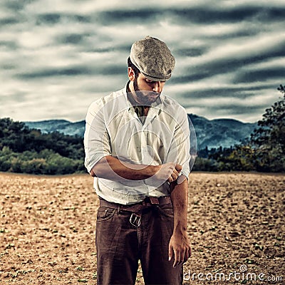 Farmer of the late nineteenth century shorten the sleeves. Stock Photo