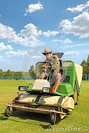 Farmer Mowing the Lawn Stock Photo