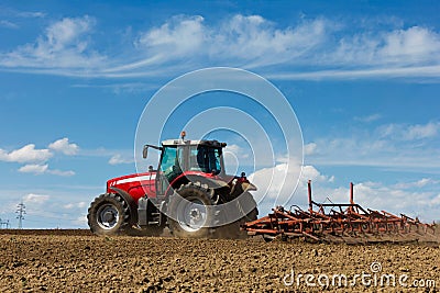 Tractor and Plow Stock Photo