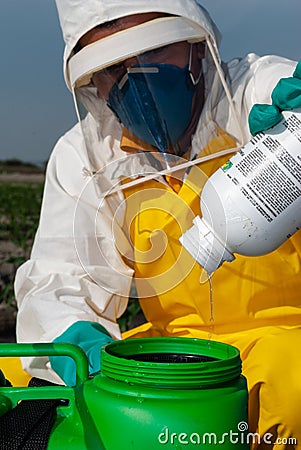 farmer preparing pesticides with safety suit Editorial Stock Photo