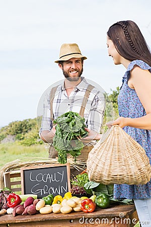 Farmer selling his organic produce Stock Photo