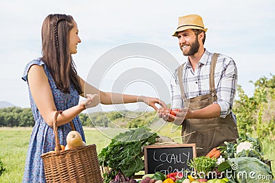 Farmer selling his organic produce Stock Photo