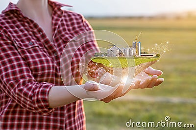 A farmer shows an island with a built grain storage Stock Photo