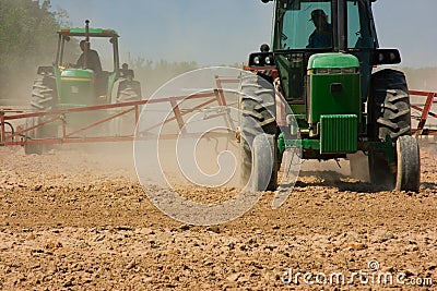 Farmers plowing the field Editorial Stock Photo