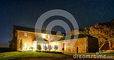 Historic Farmhouse beneath the Stars Stock Photo