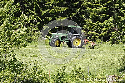 Farming tractor in action Editorial Stock Photo