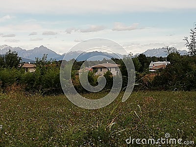 Farmlands near the alps and landscape environment in italy Stock Photo