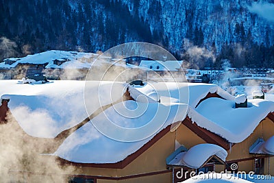 The farmyards on the foot of mountains Stock Photo