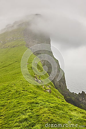 Faroe islands landscape with cliffs and atlantic ocean. Mikladalur, Kalsoy Stock Photo